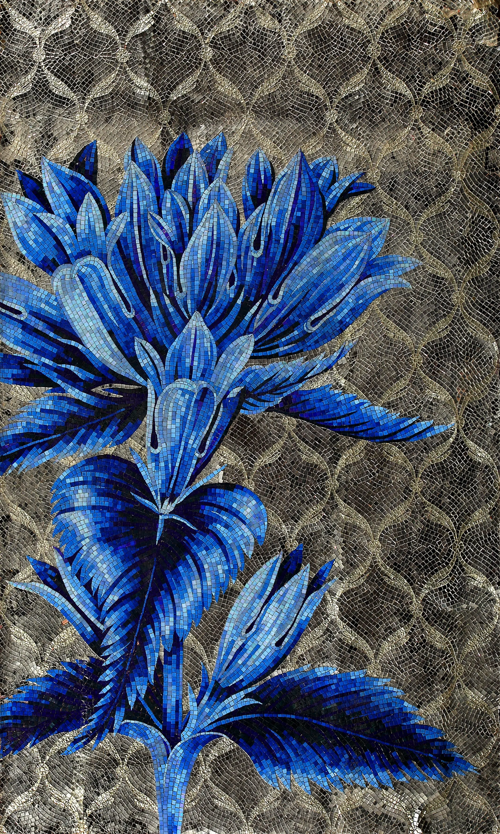 Green mosaic covering a bathroom, completing an elegant design.