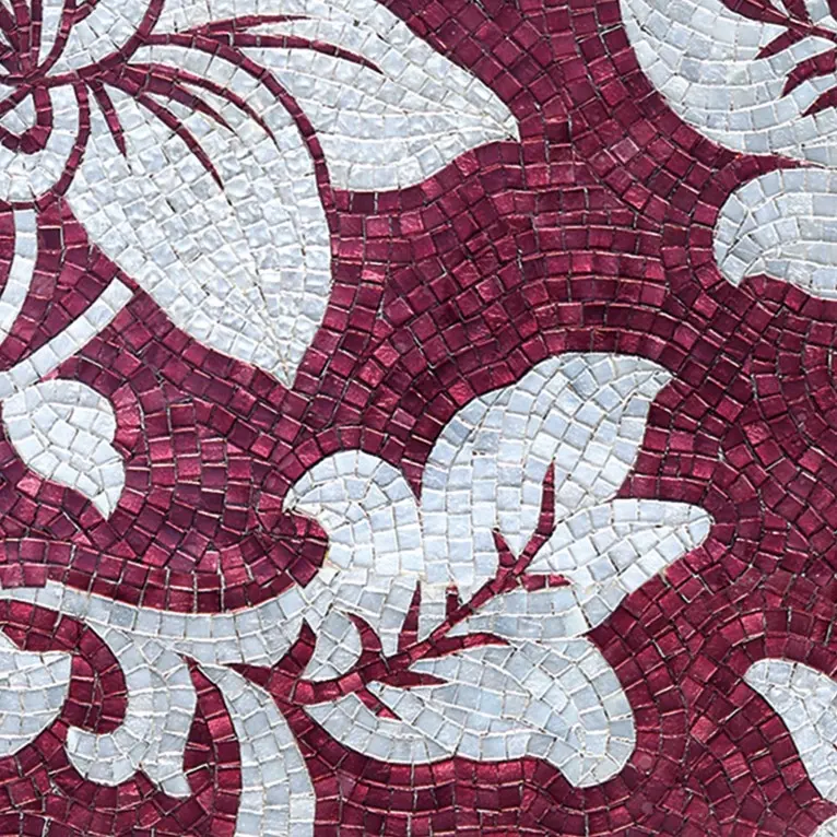 Green mosaic covering a bathroom, completing an elegant design.